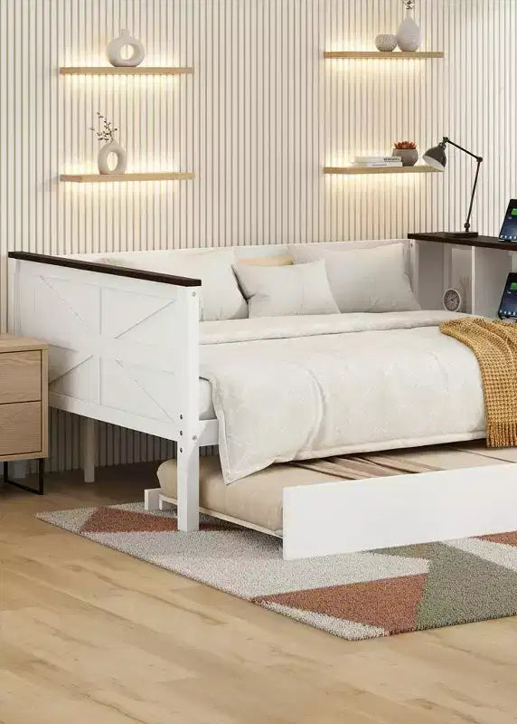 Lit de repos moderne avec station de charge, dossier rembourré et lit gigogne